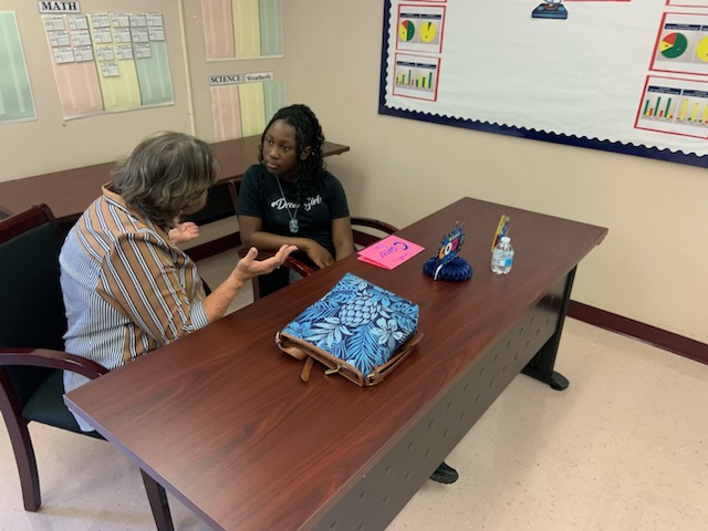 Mentors and girls at a session