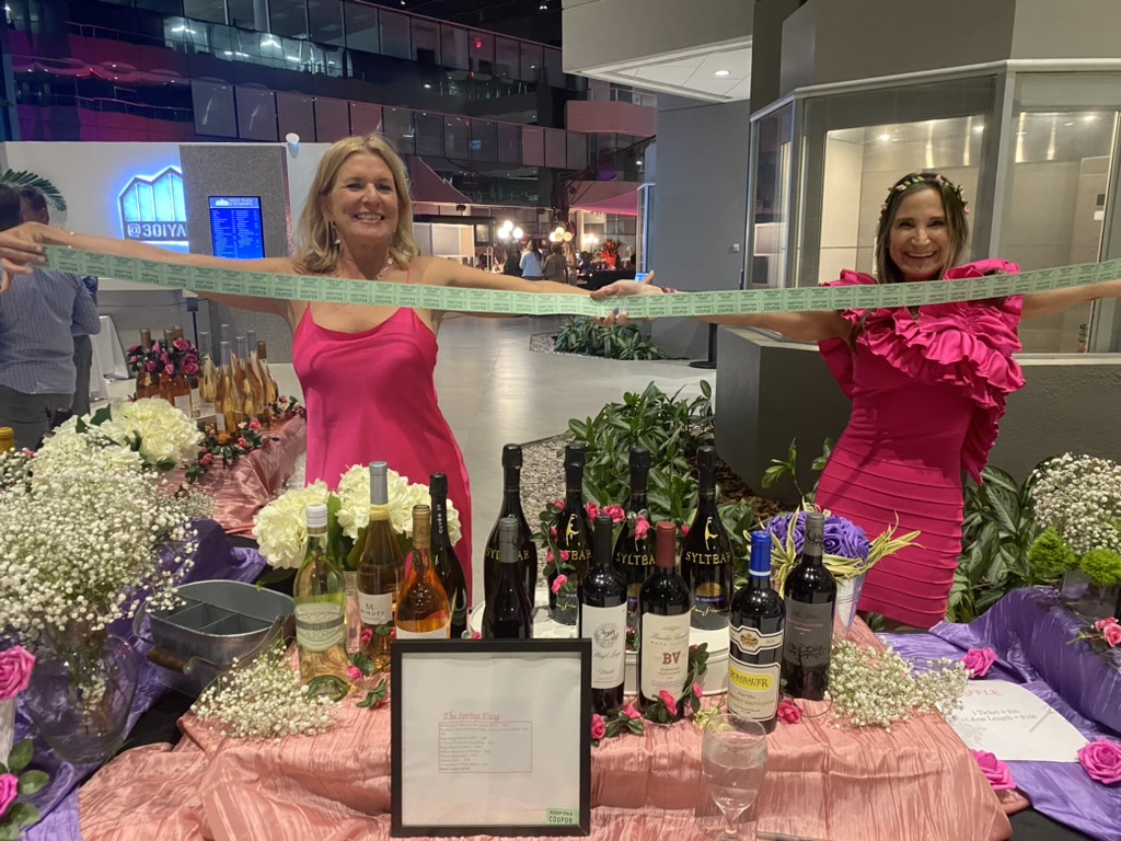 Members at a wine-pull fundraiser
