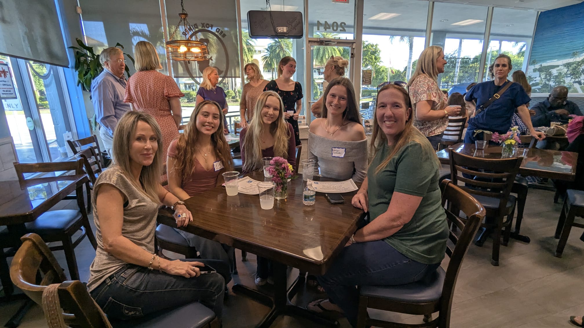 Scholarship recipients meeting with members